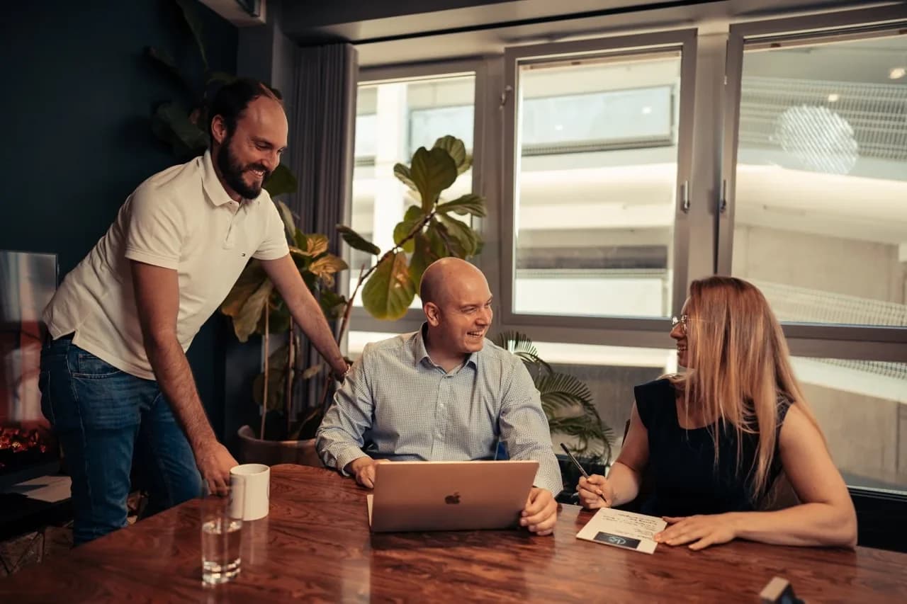 The RAVARO Systems team at work around a meeting table